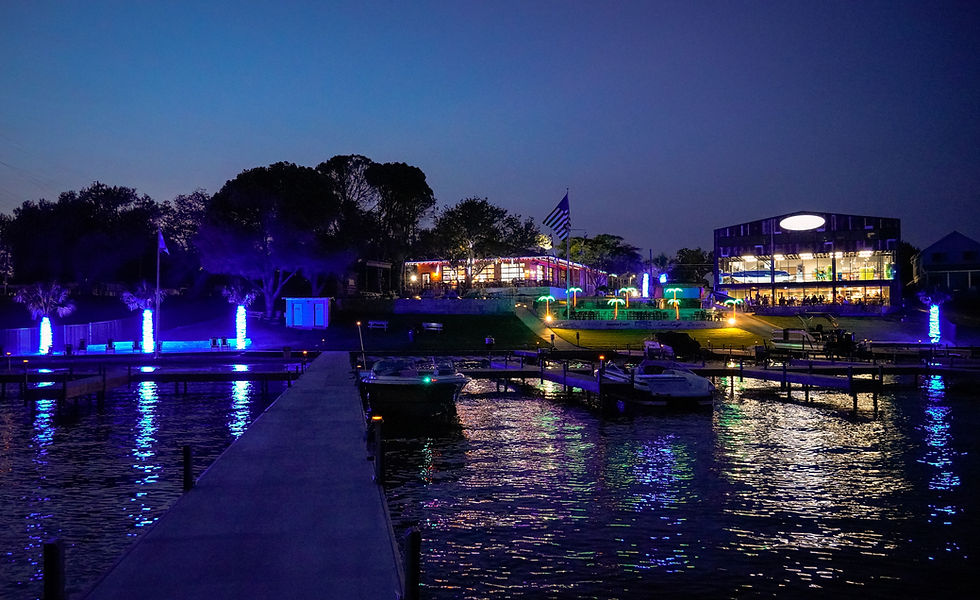 Lake LBJ Boat Town dealership at night